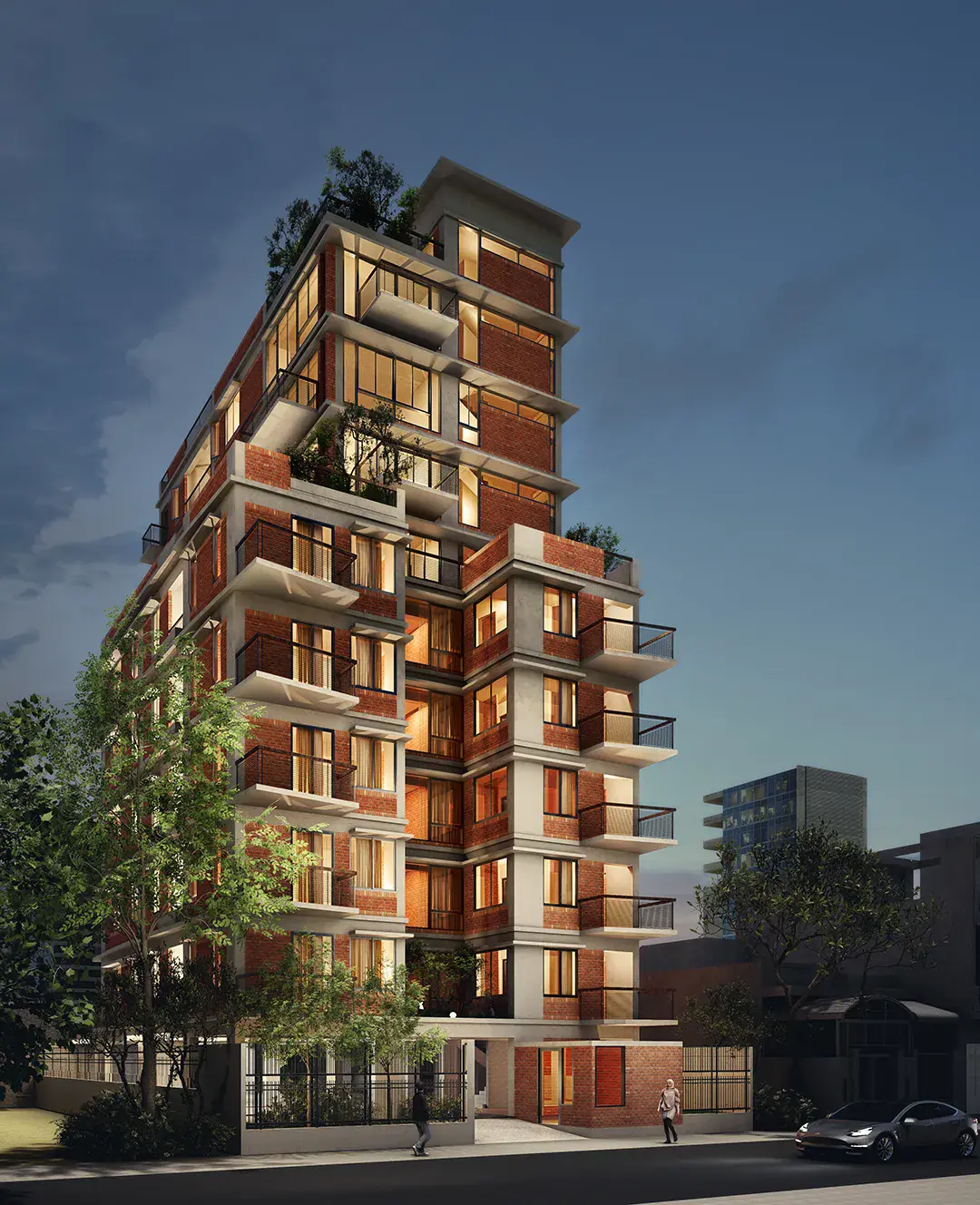 Bithi Residence at dusk with warm light behind the brick screens