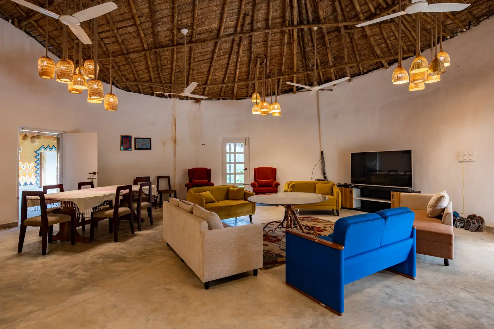 Living room with handcrafted furniture under the thatch
