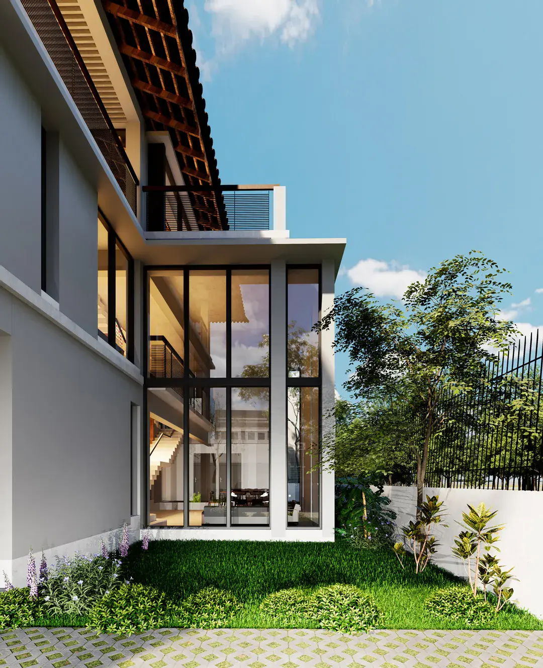Double-height glazed corner opening to the lawn