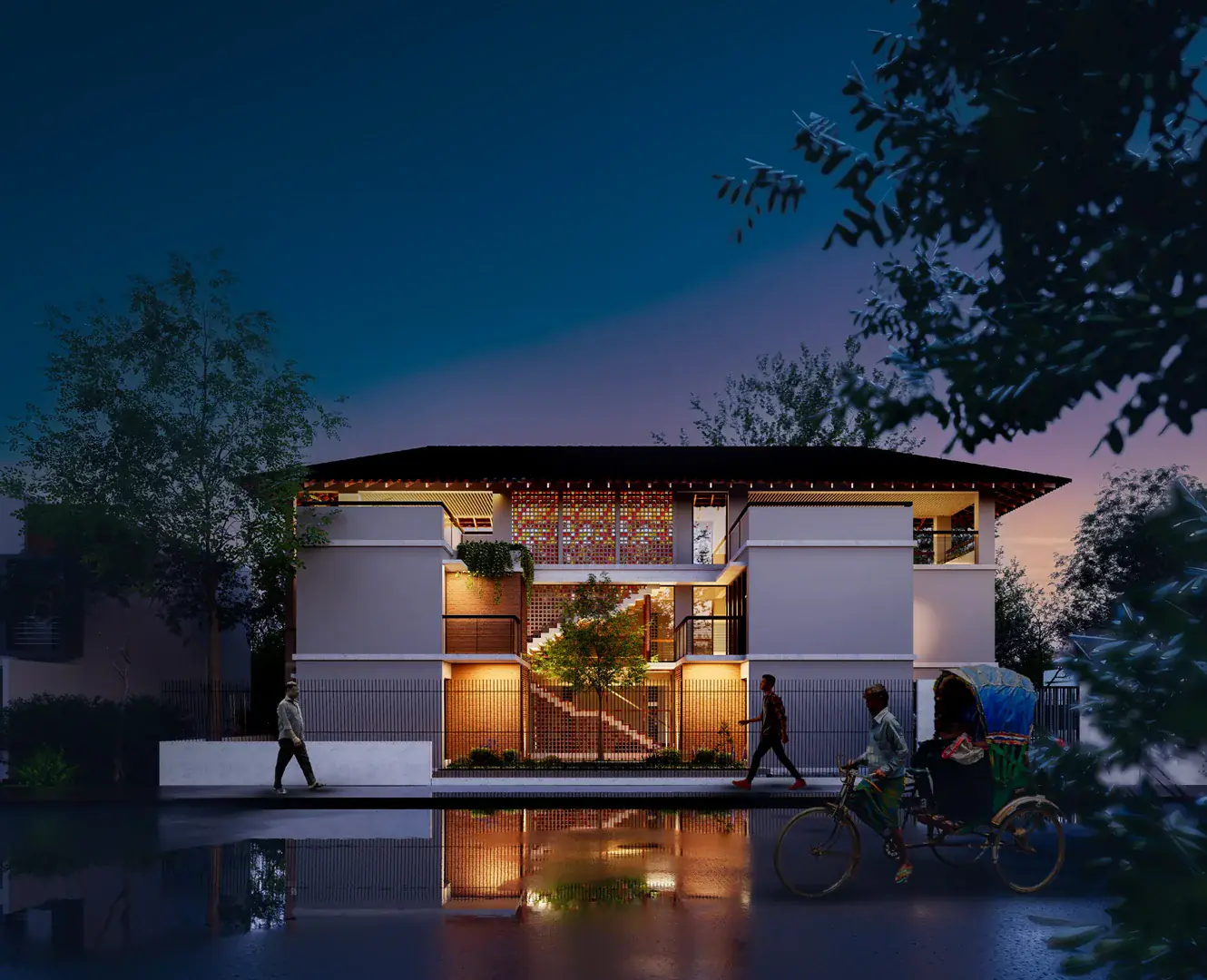 Tafazzal Residence at dusk with a reflecting pool
